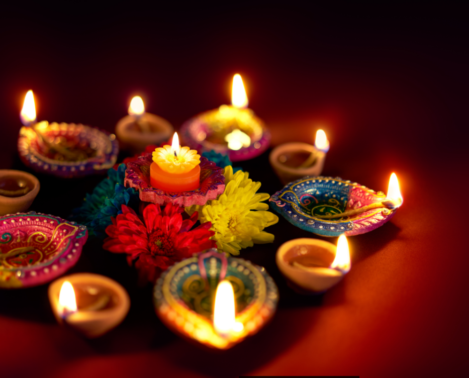 Colorful clay lamps lit during diwali celebrations